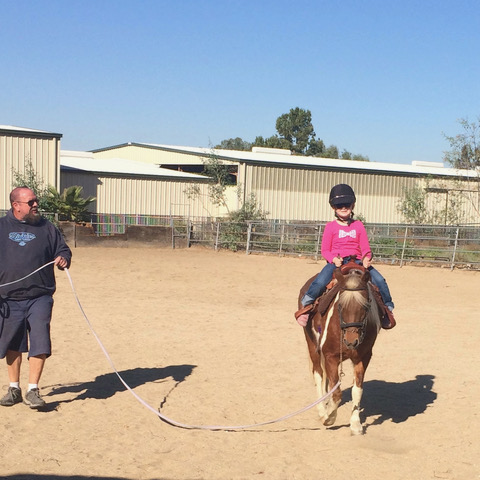 Grandpa Jim and Lauren Herman in their early equestrian days